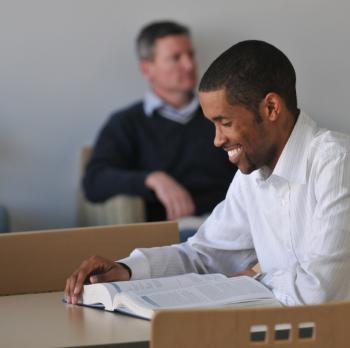 Student laughing in class